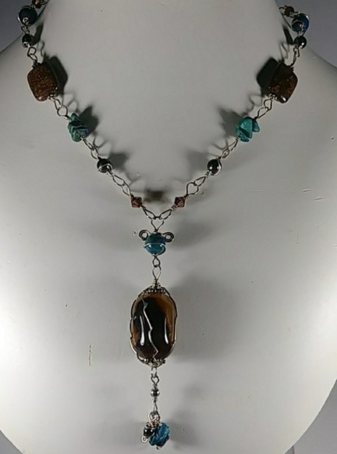 (301 -NCK) - Description: Sterling Silver Wire Chain, Various Gemstones, Wood and Crystal Beads, Carnelian Focal Bead. - Dimension: 28' L (Inches)