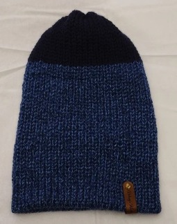 - Unisex Accessory - Material: 100% Acrylic Yarn / Custom Faux Leather Tag - Care: Hand Wash, Cold Water, Dry Flat - Construction: Reversible, Double Layered Knit Beanie (handmade) - Size: Adult (One Size) Stretchable - Color(s): Navy Blue and Multi-Colored Yarn - Item packed in clear resealable plastic storage bag